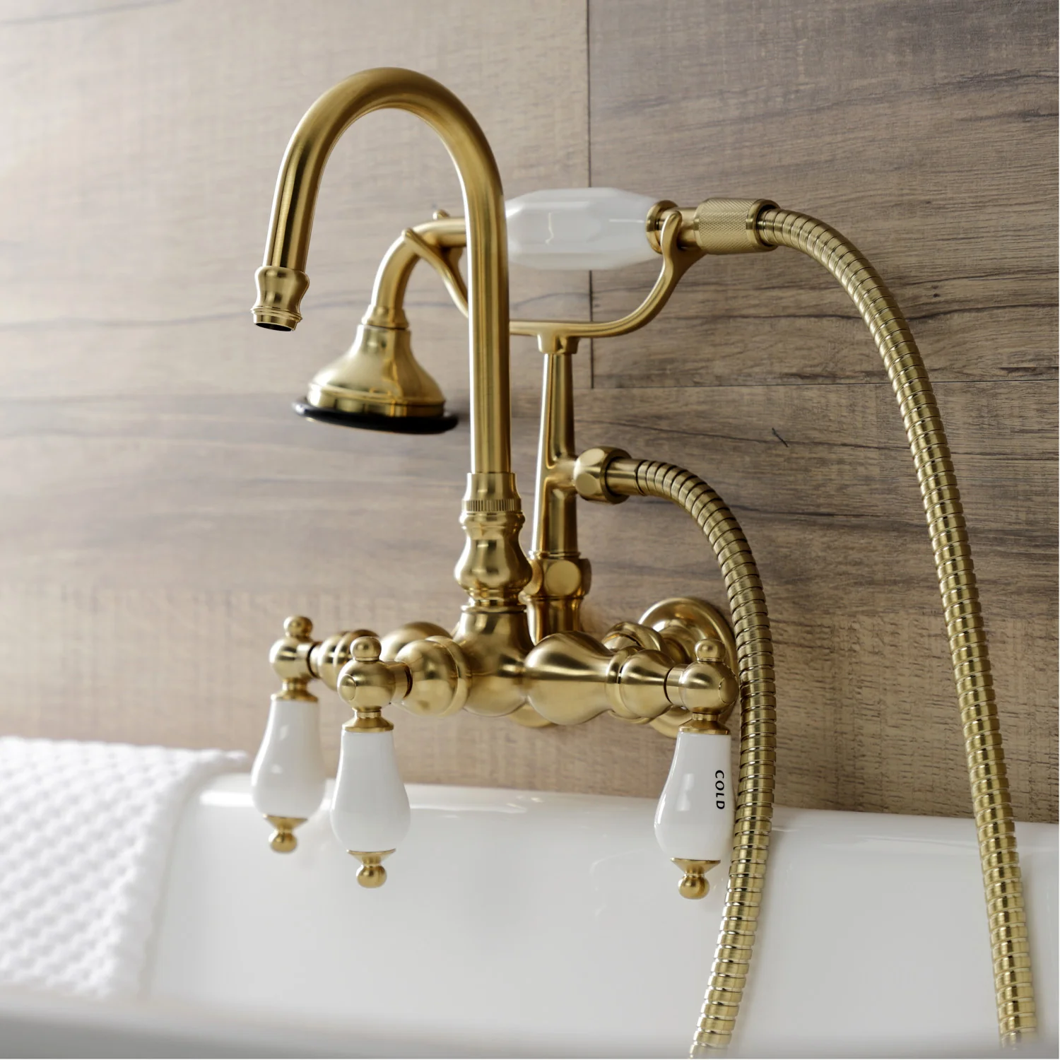 Kingston Heirloom AE9T7 - Aqua Vintage Three-Handle 2-Hole Tub Wall Mount Clawfoot Tub Faucet with Hand Shower, Brushed Brass - Image 3