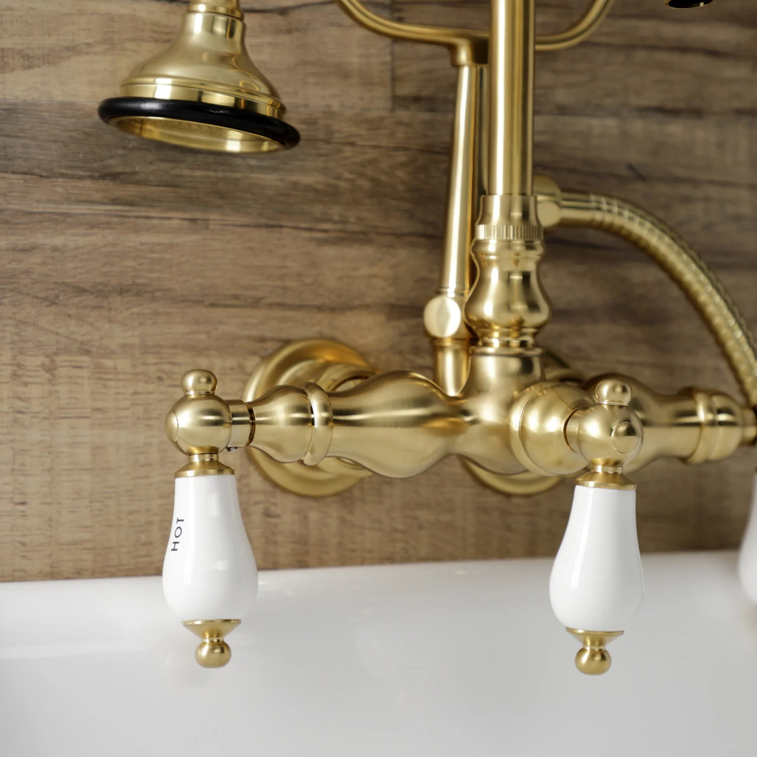 Kingston Heirloom AE9T7 - Aqua Vintage Three-Handle 2-Hole Tub Wall Mount Clawfoot Tub Faucet with Hand Shower, Brushed Brass - Image 6