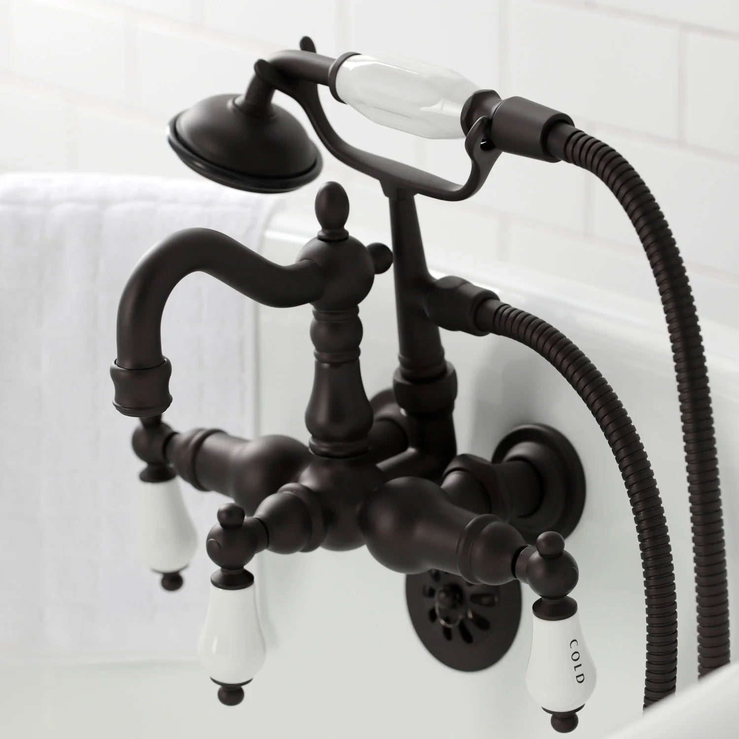 Kingston Heirloom CA1009T5 - Heritage Three-Handle 2-Hole Tub Wall Mount Clawfoot Tub Faucet with Hand Shower, Oil Rubbed Bronze - Image 4