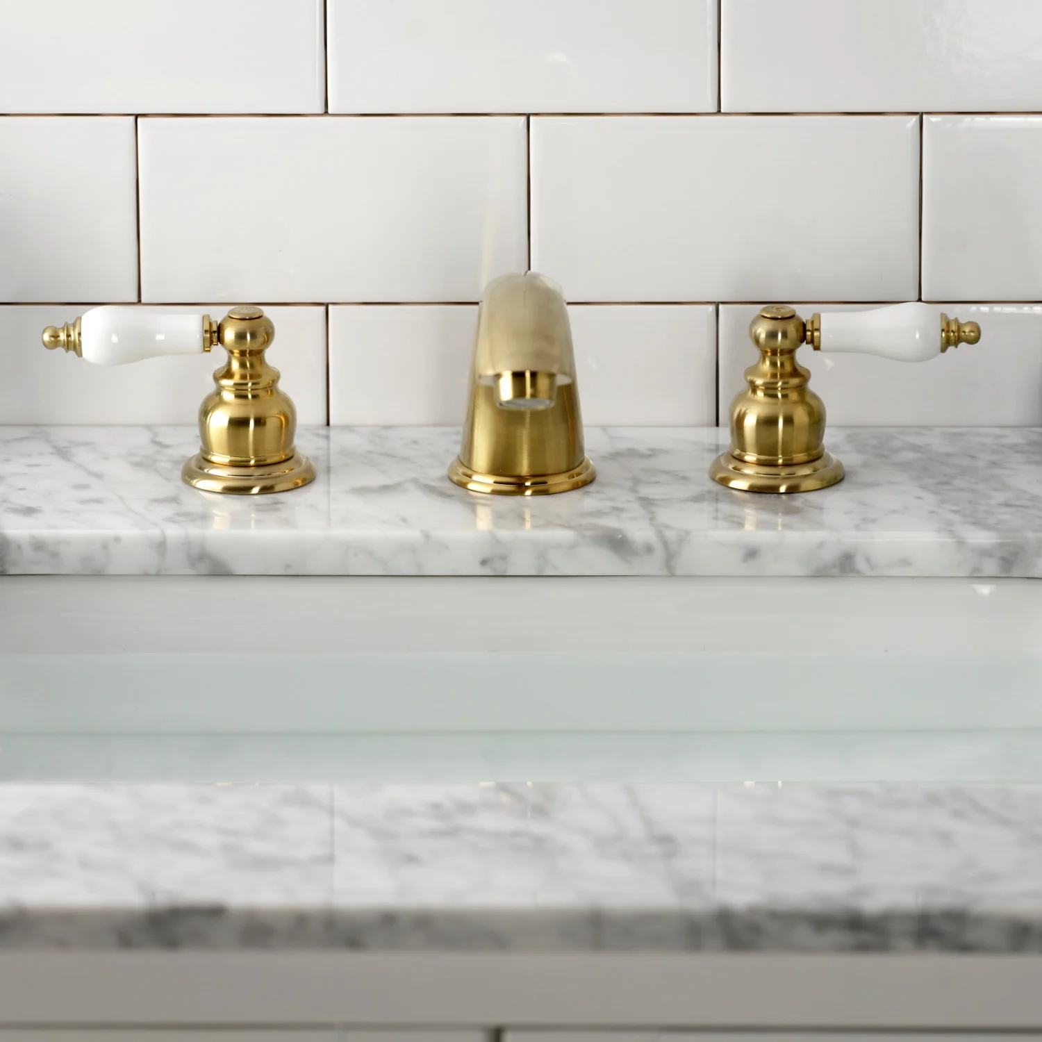 Kingston Heirloom KB977B - Victorian Two-Handle 3-Hole Deck Mount Widespread Bathroom Faucet with Pop-Up Drain, Brushed Brass - Image 3