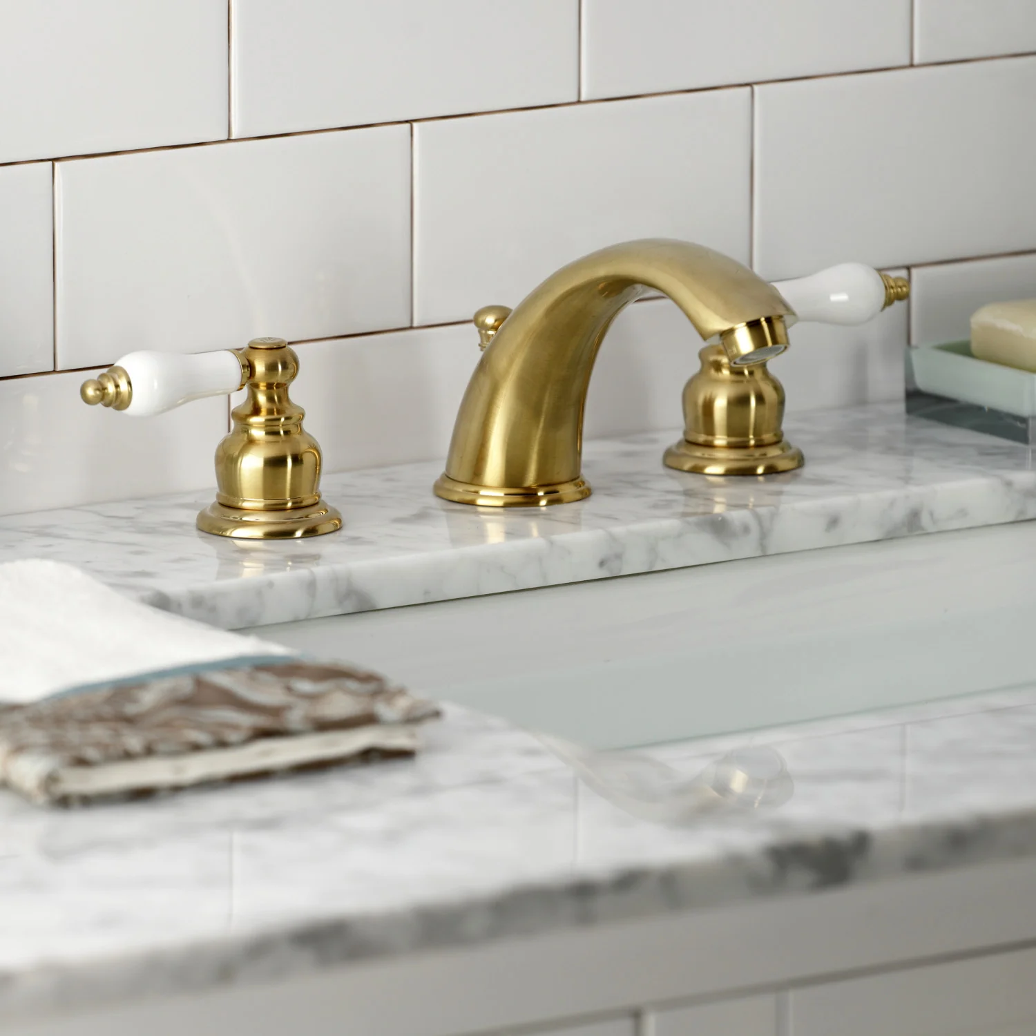 Kingston Heirloom KB977B - Victorian Two-Handle 3-Hole Deck Mount Widespread Bathroom Faucet with Pop-Up Drain, Brushed Brass - Image 4
