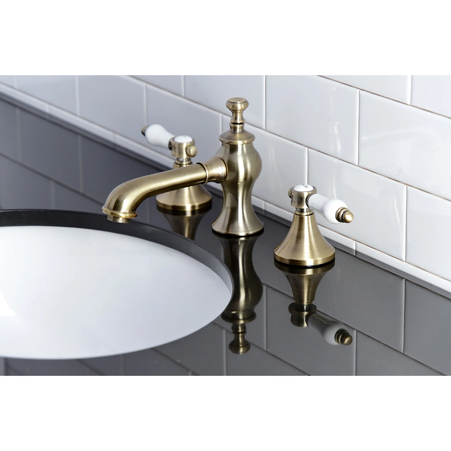 Kingston Tulare KC7063BPL - Bel-Air Two-Handle 3-Hole Deck Mount Widespread Bathroom Faucet with Brass Pop-Up, Antique Brass - Image 2