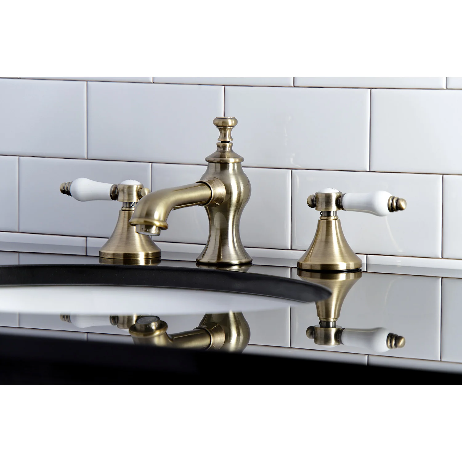 Kingston Tulare KC7063BPL - Bel-Air Two-Handle 3-Hole Deck Mount Widespread Bathroom Faucet with Brass Pop-Up, Antique Brass - Image 3