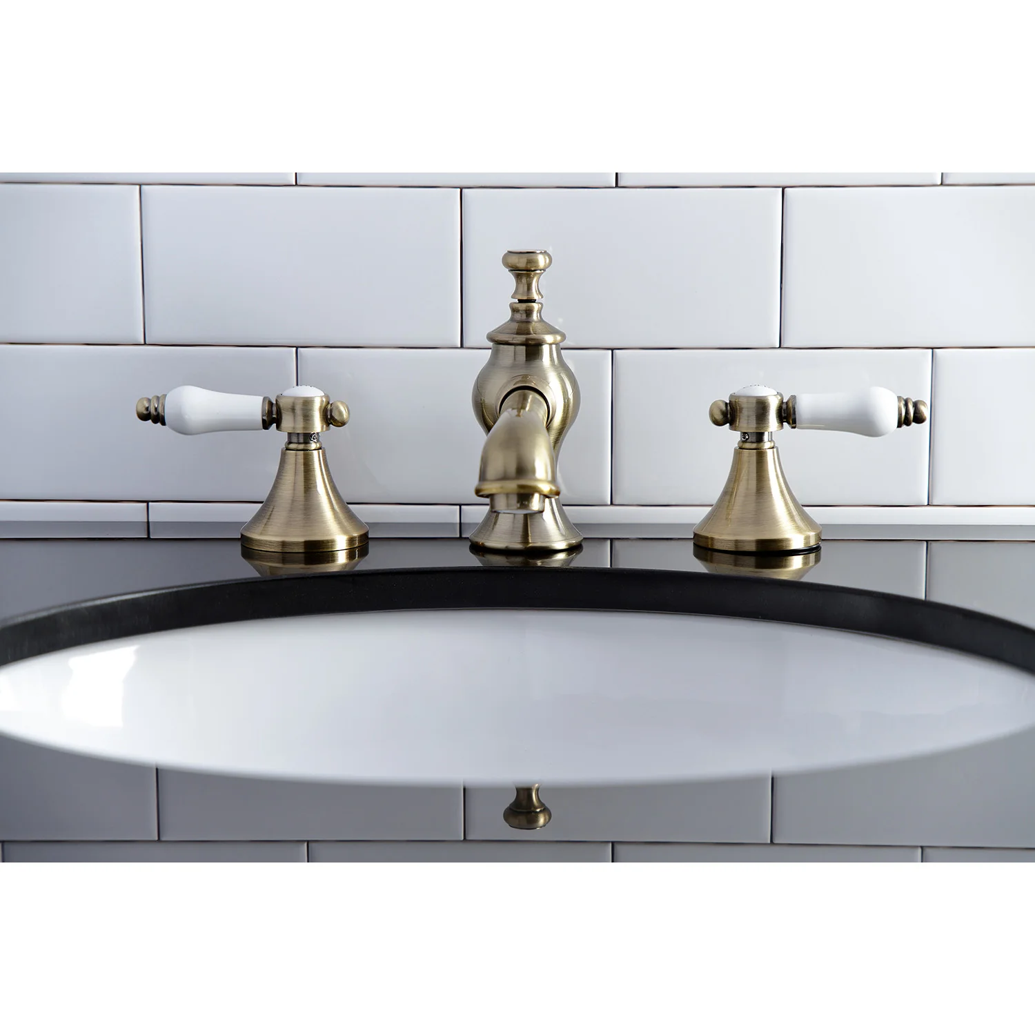 Kingston Tulare KC7063BPL - Bel-Air Two-Handle 3-Hole Deck Mount Widespread Bathroom Faucet with Brass Pop-Up, Antique Brass - Image 4