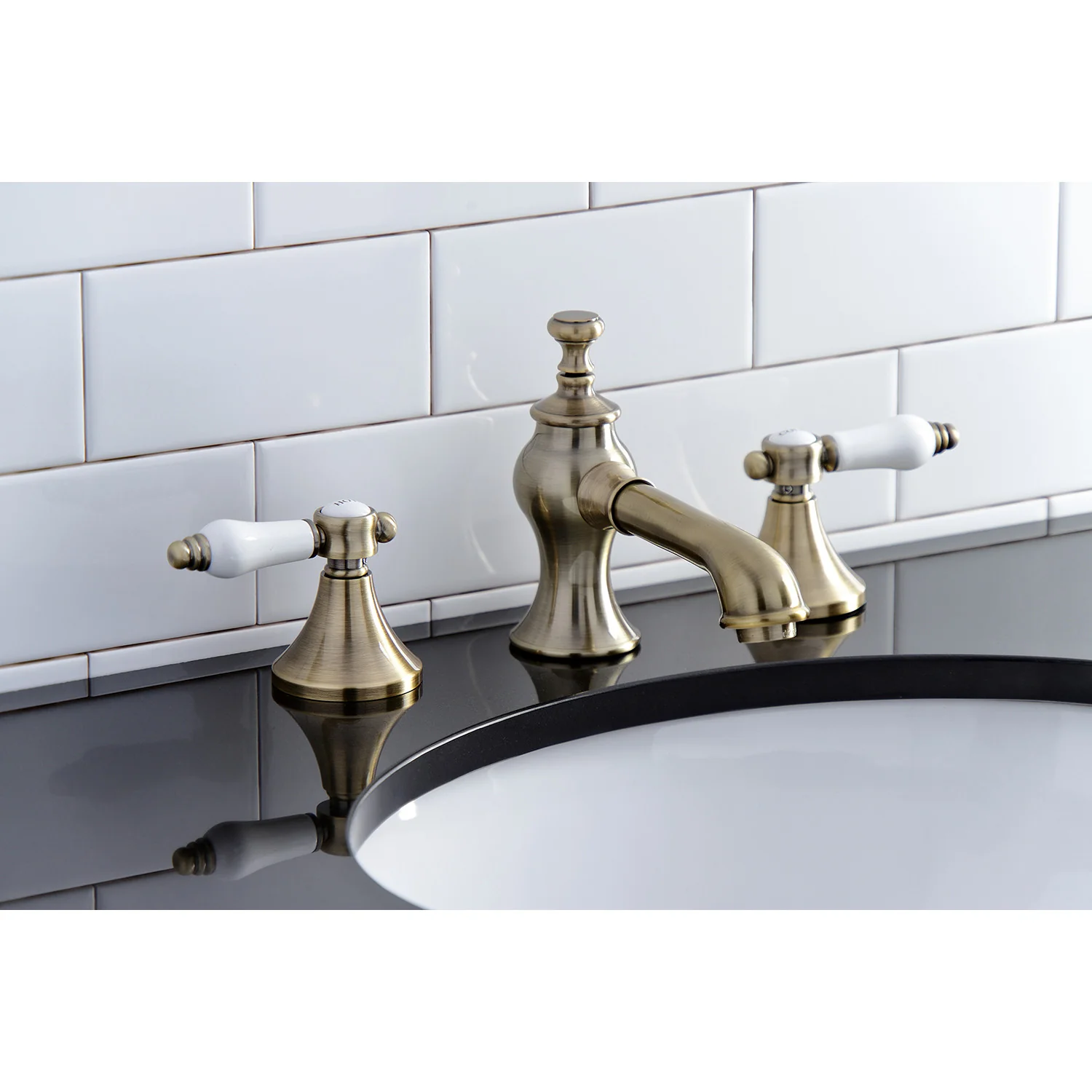 Kingston Tulare KC7063BPL - Bel-Air Two-Handle 3-Hole Deck Mount Widespread Bathroom Faucet with Brass Pop-Up, Antique Brass - Image 5
