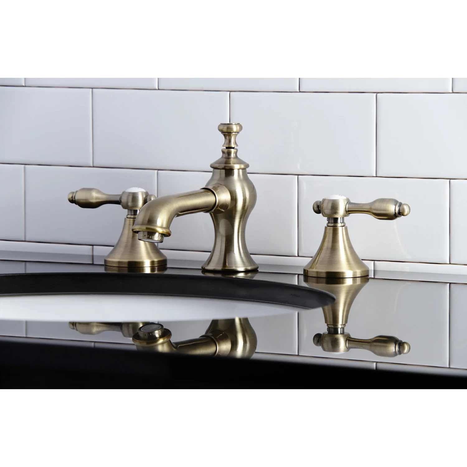 Kingston Tulare KC7063TAL - Tudor Two-Handle 3-Hole Deck Mount Widespread Bathroom Faucet with Brass Pop-Up, Antique Brass - Image 3