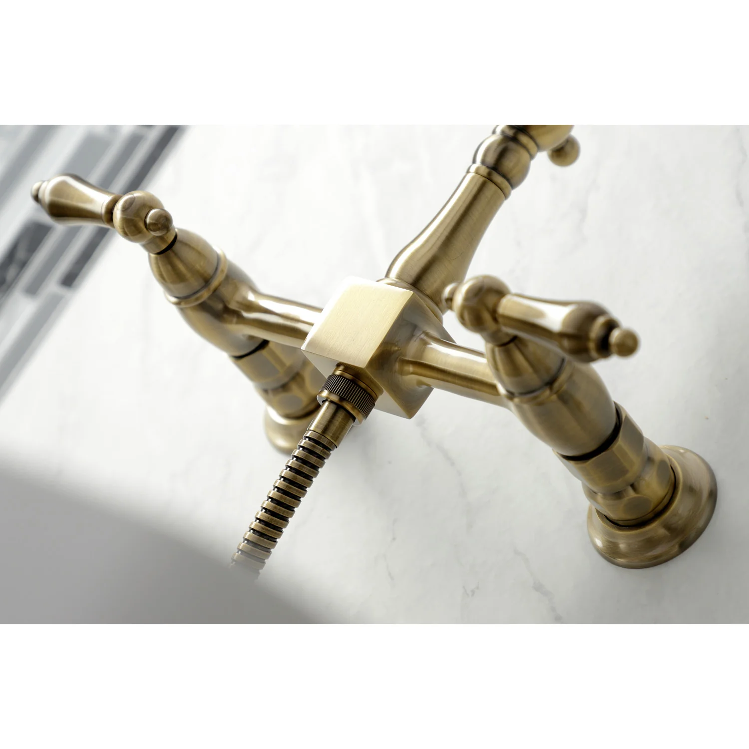 Kingston Heirloom KS1263ALBS - Heritage Two-Handle 3-Hole Wall Mount Bridge Kitchen Faucet with Brass Sprayer, Antique Brass - Image 3