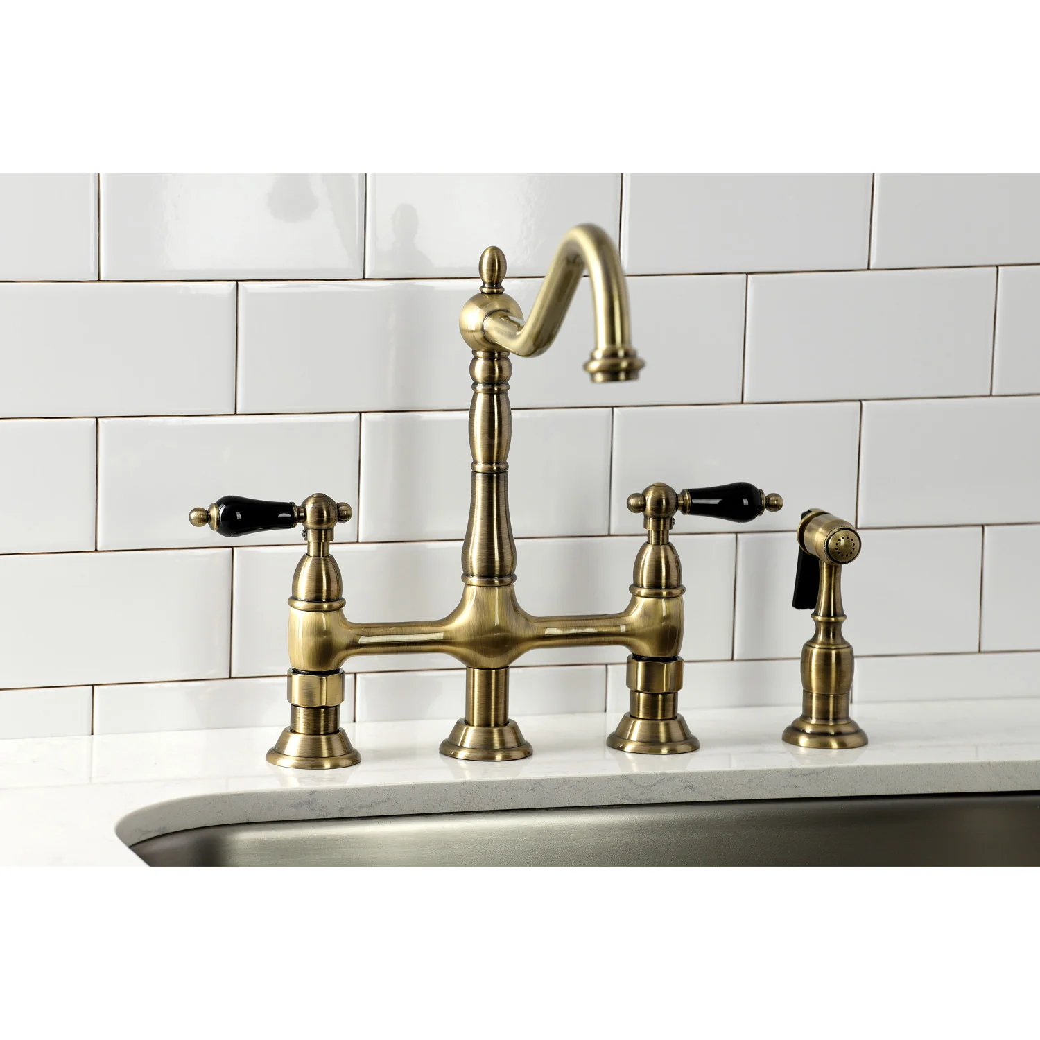 Kingston Heirloom KS1273PKLBS - Duchess Two-Handle 4-Hole Deck Mount Bridge Kitchen Faucet with Brass Sprayer, Antique Brass - Image 3