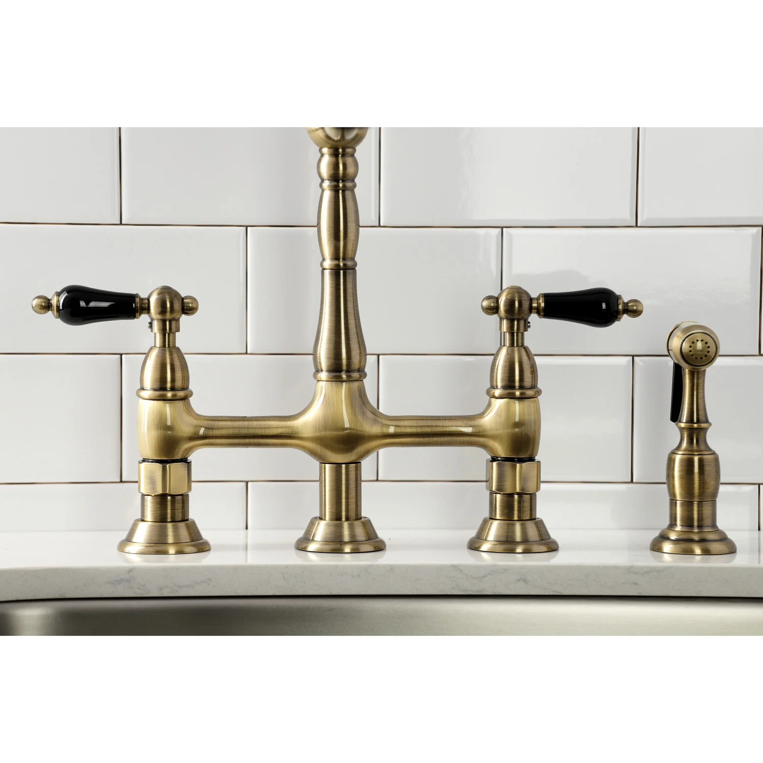 Kingston Heirloom KS1273PKLBS - Duchess Two-Handle 4-Hole Deck Mount Bridge Kitchen Faucet with Brass Sprayer, Antique Brass - Image 4