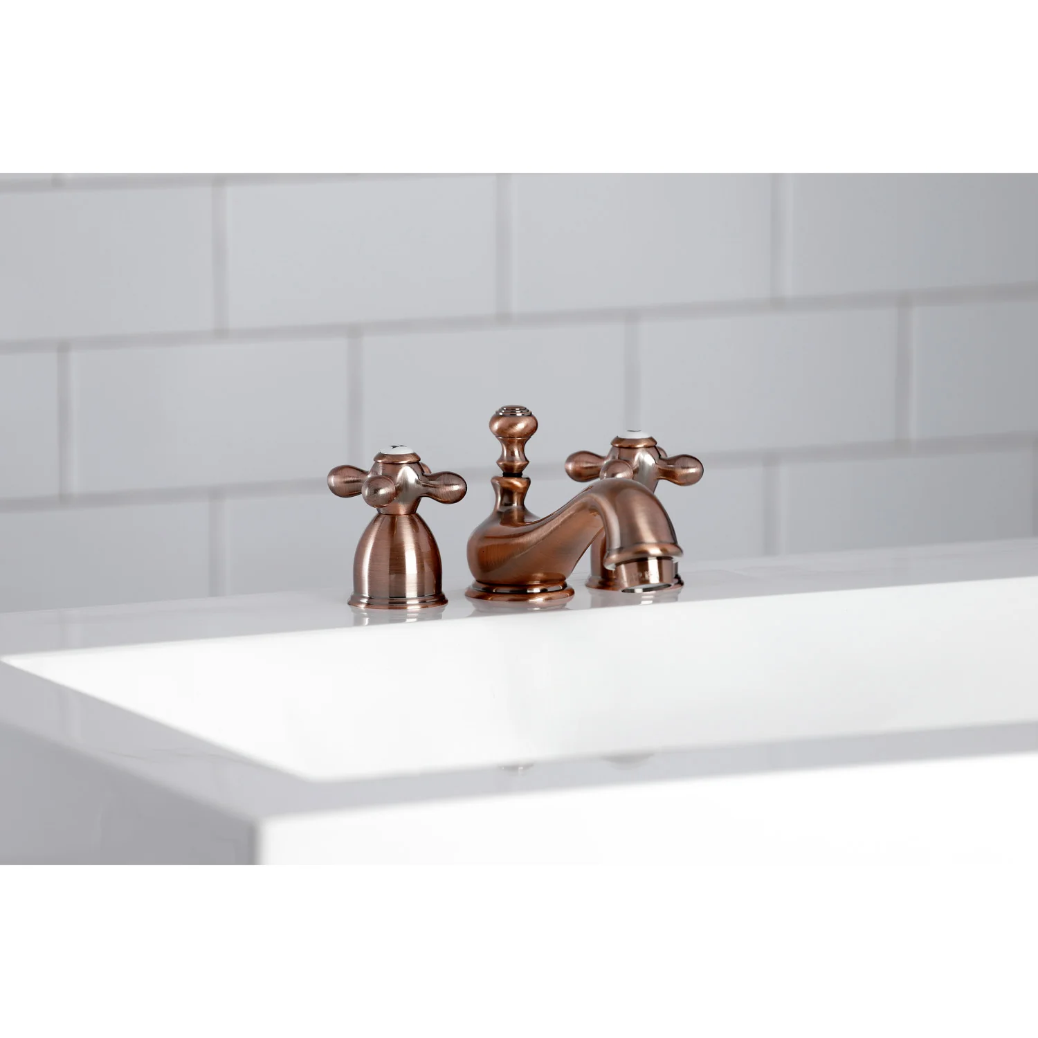 Kingston Heirloom KS395AXAC - Restoration Two-Handle 3-Hole Deck Mount Mini-Widespread Bathroom Faucet with Brass Pop-Up, Antique Copper - Image 2