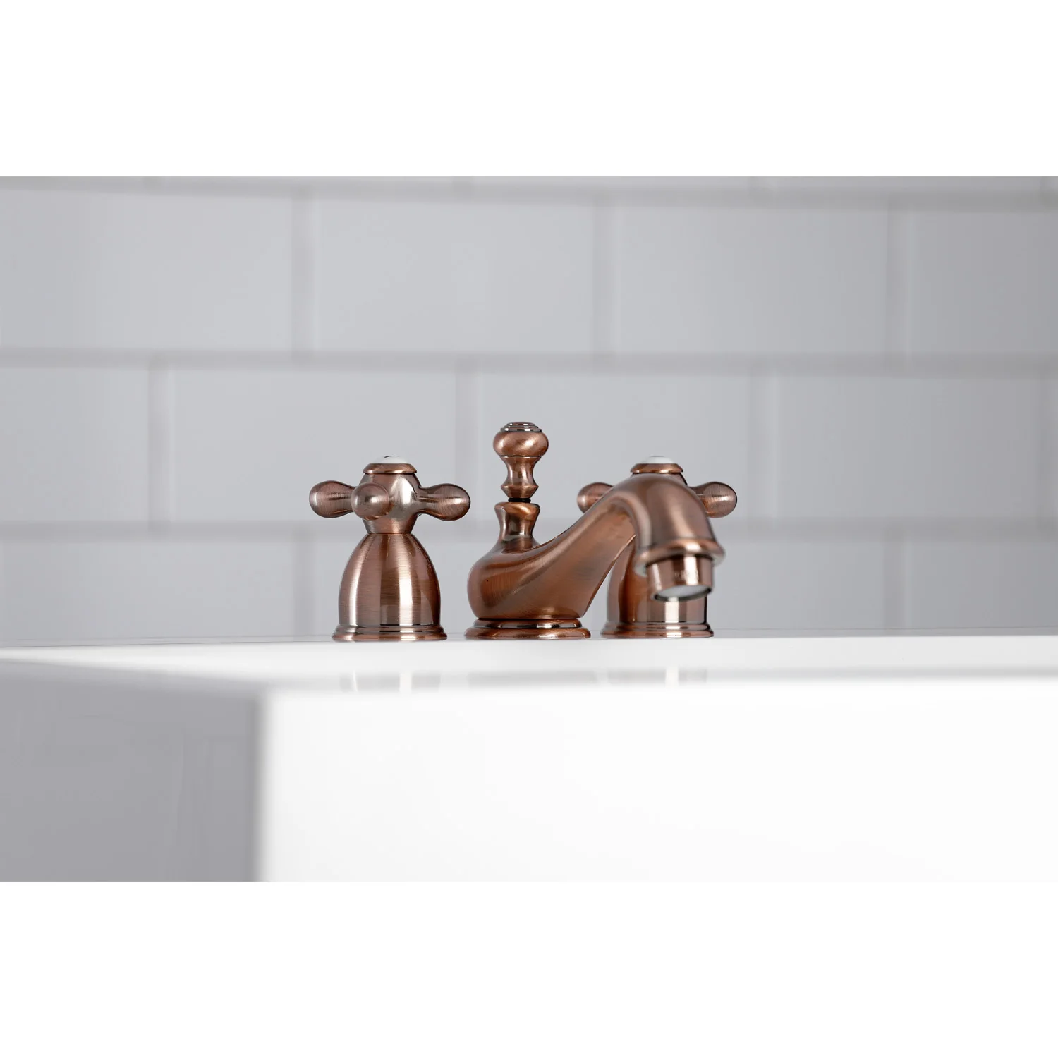 Kingston Heirloom KS395AXAC - Restoration Two-Handle 3-Hole Deck Mount Mini-Widespread Bathroom Faucet with Brass Pop-Up, Antique Copper - Image 3