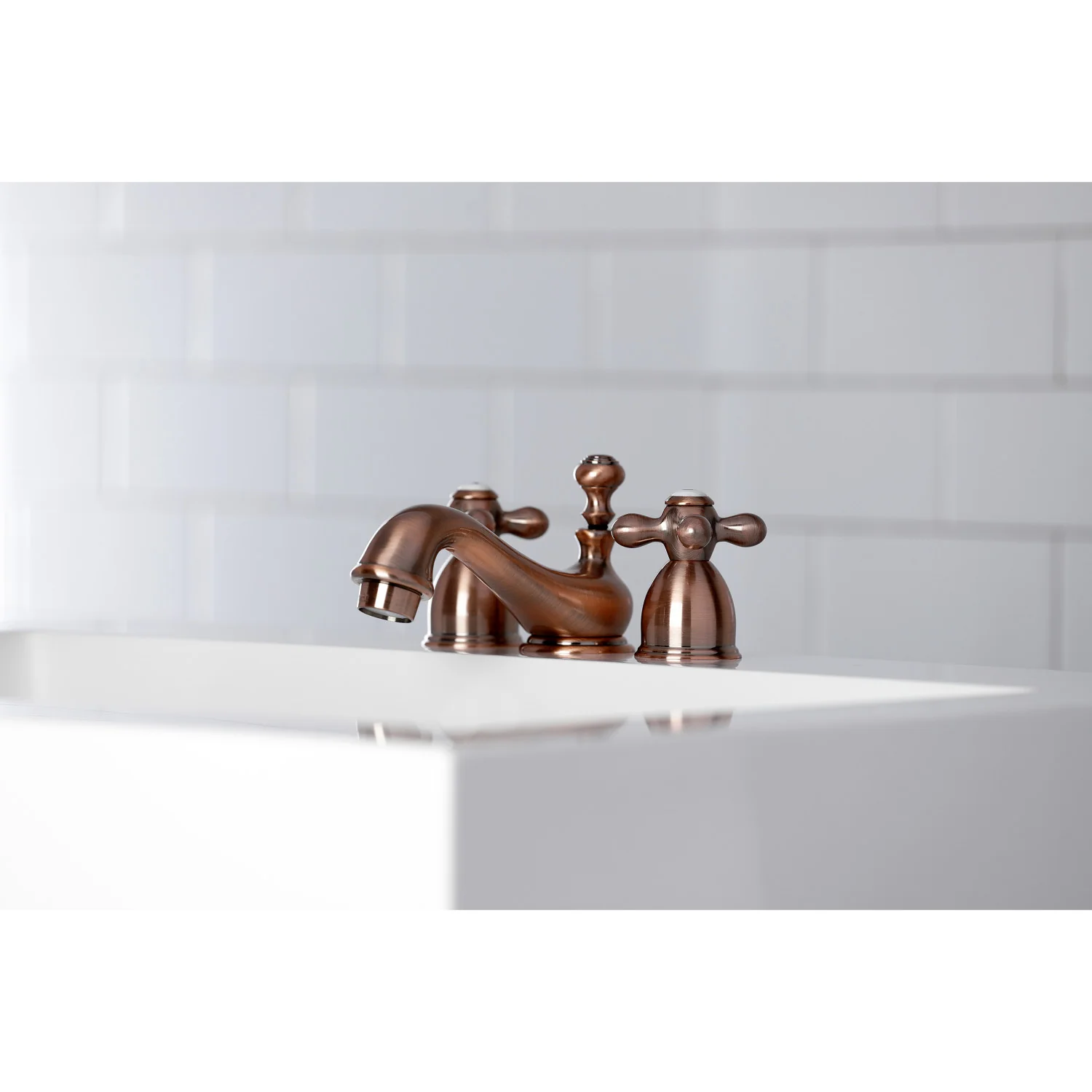 Kingston Heirloom KS395AXAC - Restoration Two-Handle 3-Hole Deck Mount Mini-Widespread Bathroom Faucet with Brass Pop-Up, Antique Copper - Image 4